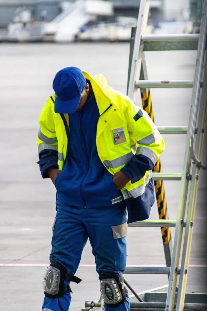 vehicle, man, safety, blue-collar worker, clothing, high-visibility clothing, person, people, construction worker, helmet, financial security, workwear, hardhat, industry, personal protective equipment, coat, gloves, outerwear, pants, adult, worker, machinery, face, outdoors, construction, workwear, workwear, workwear, workwear, workwear